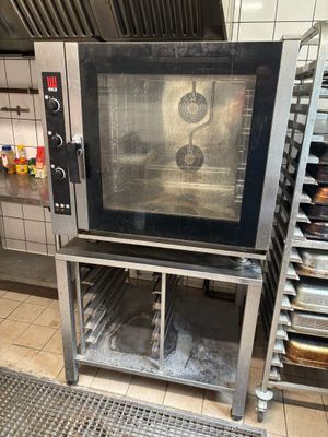 a large oven that is sitting in the middle of a kitchen