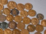 a lot of coins that are on a table