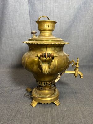brass plated coffee pot on stand with spout and spout on top