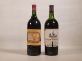 deux bouteilles de vin posées l'une à côté de l'autre sur une table