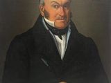 un vieux tableau représentant un homme en costume noir et nœud papillon