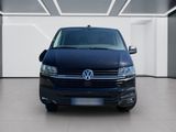 the front view of a blue van parked in a white room
