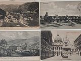 many old postcards with pictures of buildings and cars