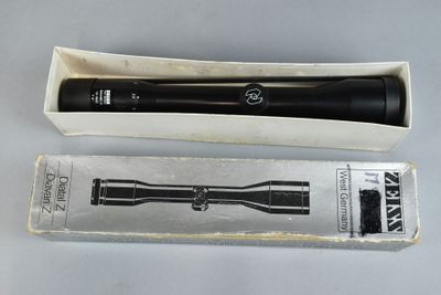 an open box with a flashlight inside of it sitting on a table