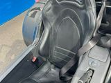 an image of a car with a seat and a steering wheel