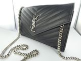 saint laurent black chevrone leather clutch bag with chain strap