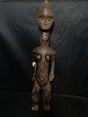 Grande statuette féminine en bois sculpté - Photo 1