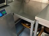 a microwave and a dishwasher in a small kitchen