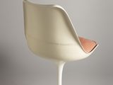 an image of a white chair with a wooden seat on a white pedestal