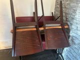 two chairs that are sitting next to each other