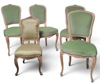 Suite de quatre chaises de style Louis XV rechampies crème à…