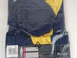 the back of a blue shirt with a yellow collar is wrapped in a plastic bag