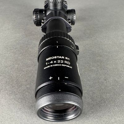 an image of a close up of a camera lens on a table