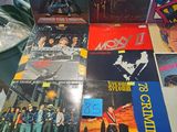 a lot of vinyl records on the table