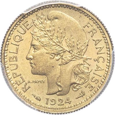 a close up of a coin with a woman ' s head on it