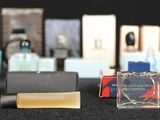 a lot of perfume bottles that are on a table