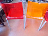 two chairs that are sitting next to each other on the floor
