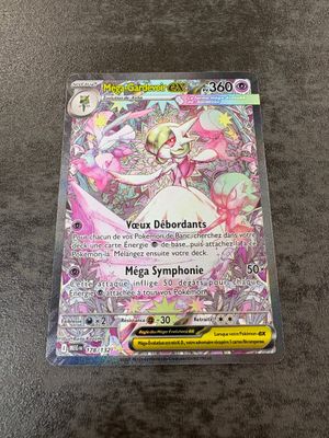 a close up of a pokemon card on a table