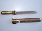 two knives that are sitting on a table