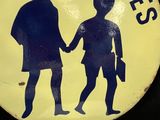 a yellow sign with a picture of a boy and a girl holding hands