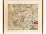 a large antique map of the british continent, with a gold frame