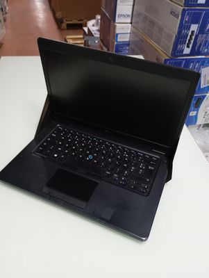 a laptop that is sitting on a table in a store