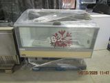 a fish tank sitting on top of a pallet in the middle of a room