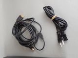 a picture of a remote control and a cable