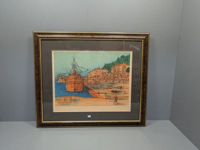 tableau encadré représentant un bateau dans un port