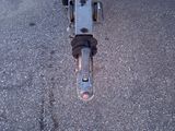 a scooter that is parked on the street