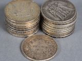 a lot of coins sitting on top of each other