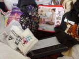 a lot of items that are sitting on a bed
