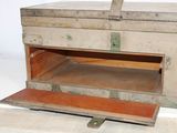 an old wooden box with a drawer inside of it