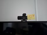a video camera that is sitting on top of a monitor