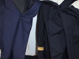 two pieces of clothing that are laying on the floor
