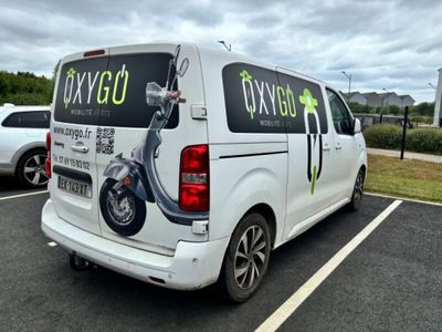 a white van that is parked in a parking lot