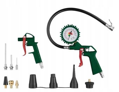 a close up of a pressure gun with a hose and other tools