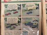 de nombreuses bandes dessinées exposées sur une table rouge