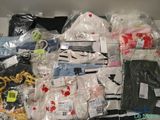 a pile of clothing that is sitting on a table