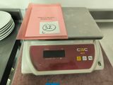 an image of a kitchen scale with plates on it