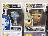 two boxes of funko pop vinyl figures on display in a store