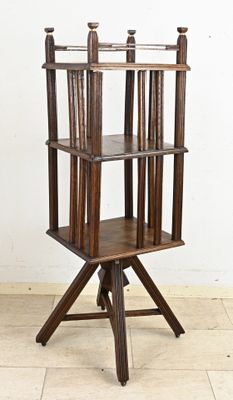 a wooden shelf that has a shelf on top of it