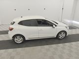 a picture of a white car parked in a garage