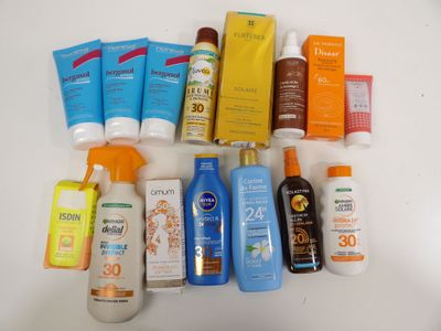 many sunscreens and lotions on the table