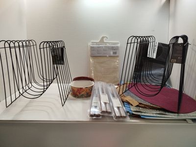 a shelf that has a bunch of items on top of it