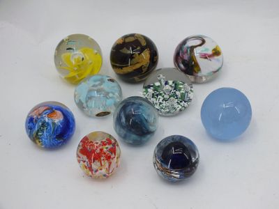 a lot of glass beads that are on a table