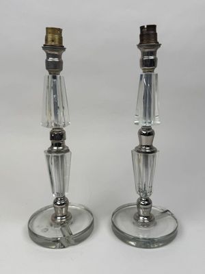 pair of silver plated candlesticks with clear glass bases