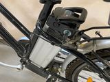 a close up of a bicycle with a basket on the back