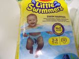 a bag of swim nappies sitting on a table