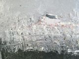 a picture of a painting of a city with lots of ice on it
